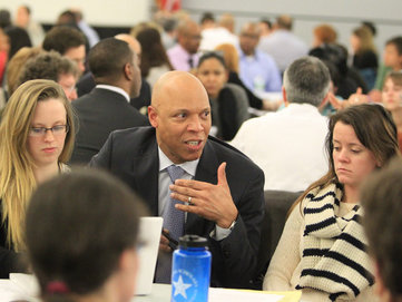 Hundreds turned out for a strategy, policy, and priorities meeting on Jan. 13, 2014. Dr. William Hite, Jr, Superintendent of Schools talks to one of the groups. School officials acknowledge today that 300-plus layoff notices are going out. (CHARLES FOX/Staff Photographer/File)